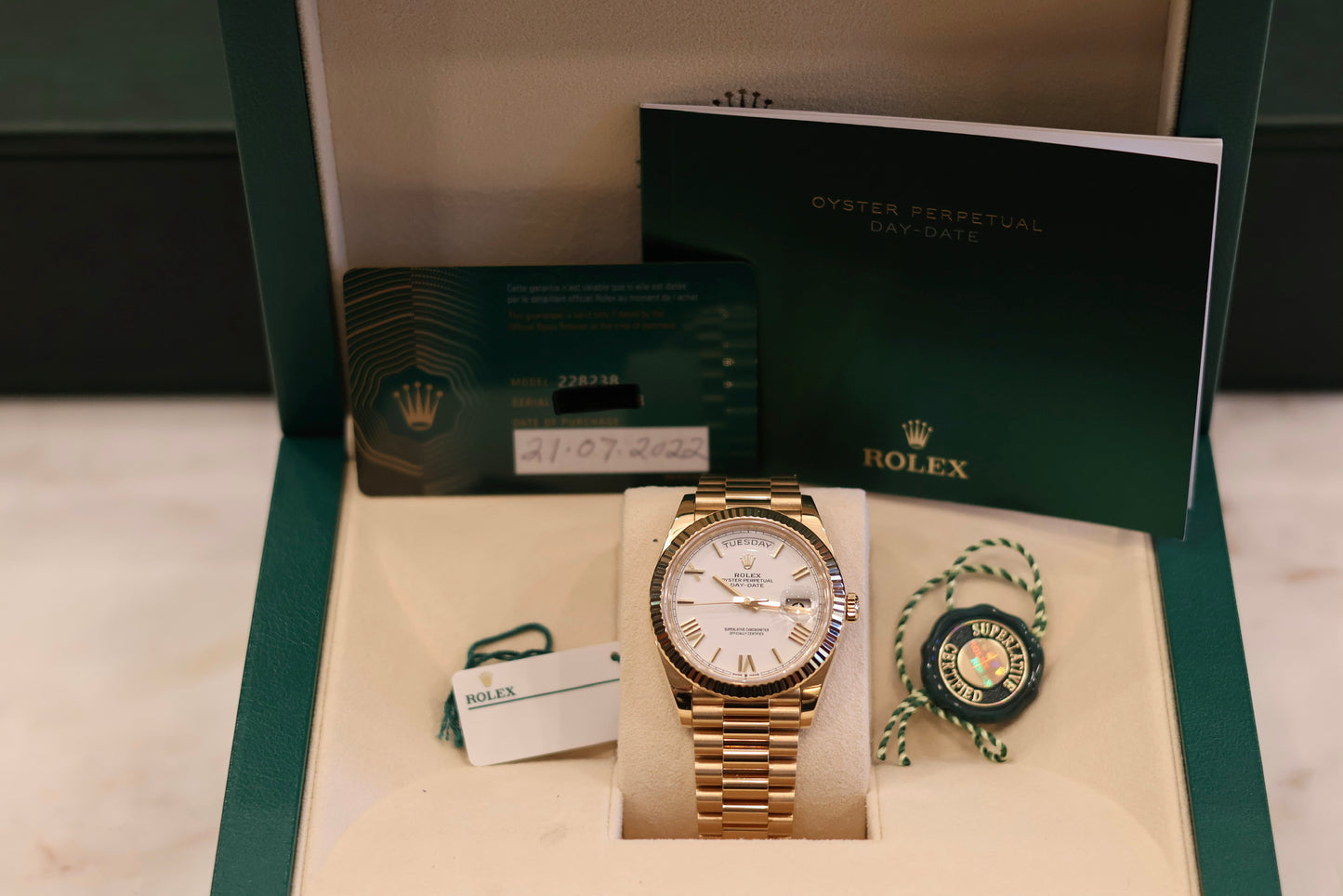 Rolex Day-Date 40 Yellow Gold white Dial 228238